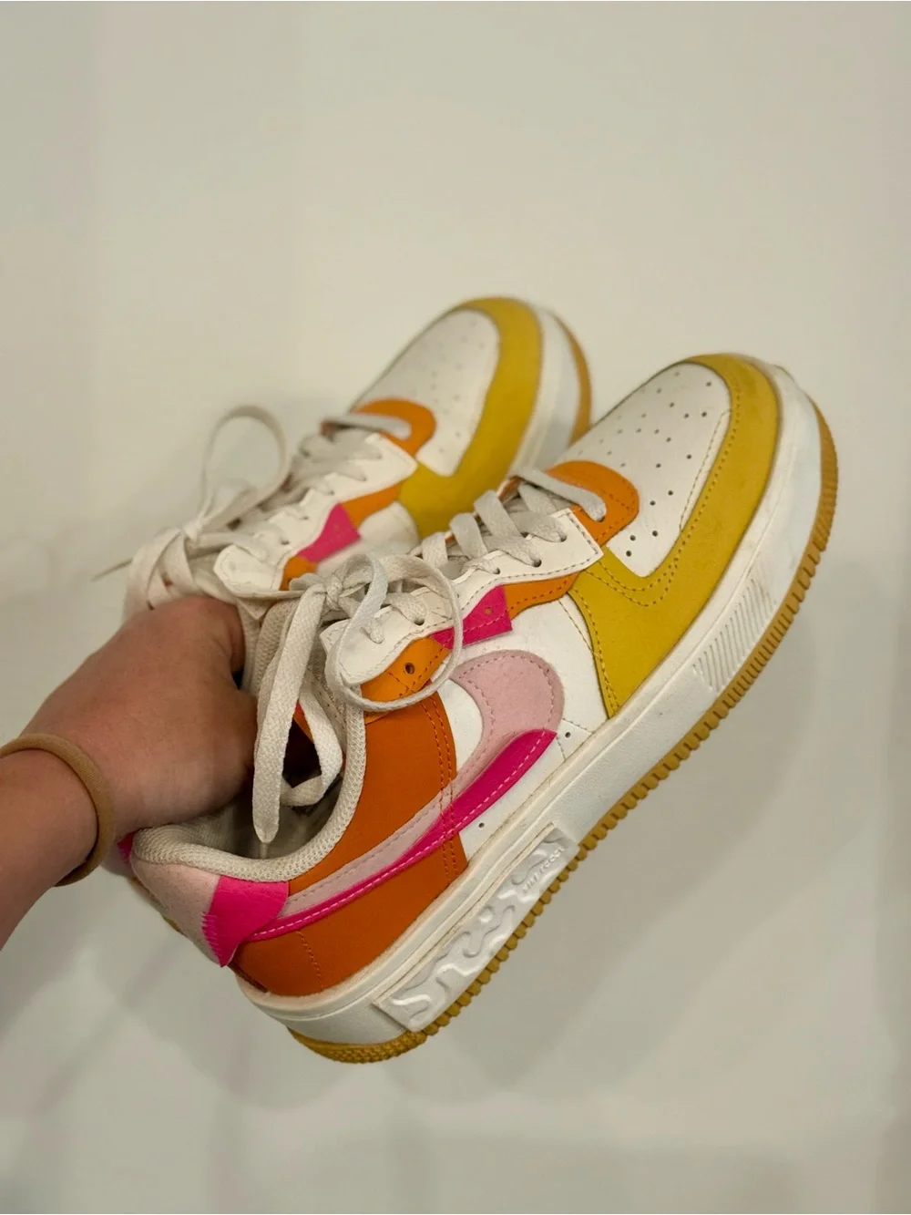 Nike White Low-Top Sneakers with Yellow, Orange and Pink Accents